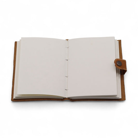 Bőrkötéses dombornyomott notesz – Bézs virágmintás – 17,8×12,7 cm